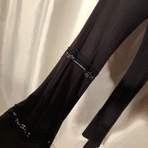Black light T-shirt knit pants with 2 tows of open lacework. Elastic waist